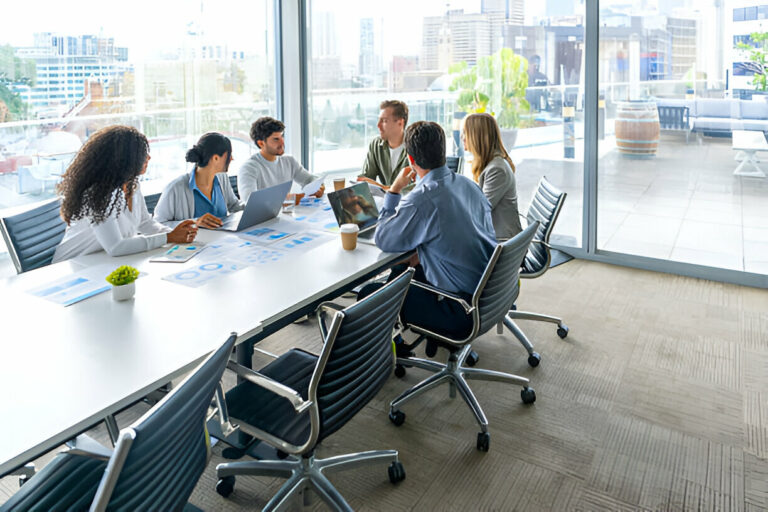 Team brainstorming new business model using the Business Model Canvas